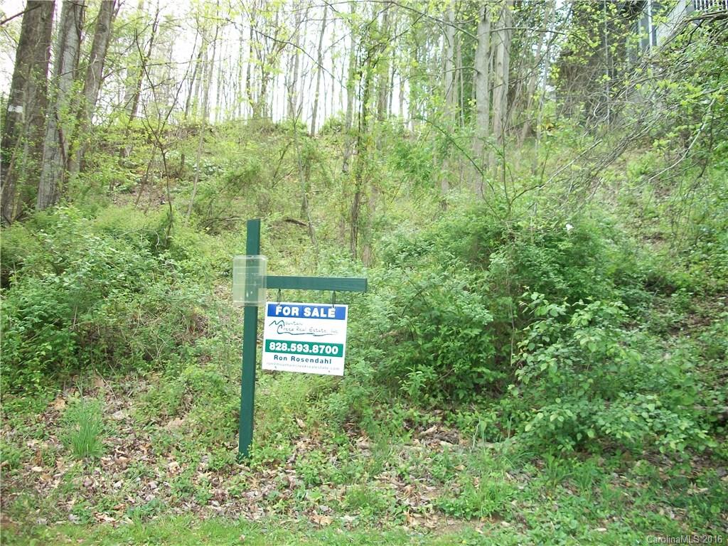 Lot#14 Aldersgate Road, Unit 14 Waynesville, NC 28786 - Photo 11 of 16 a close up of a sign of under a tree