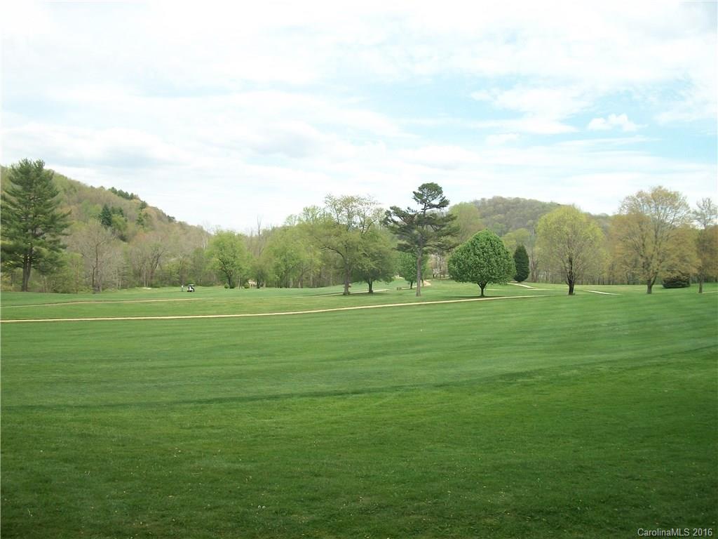 Lot#14 Aldersgate Road, Unit 14 Waynesville, NC 28786 - Photo 14 of 16 a view of grassy field with mountain