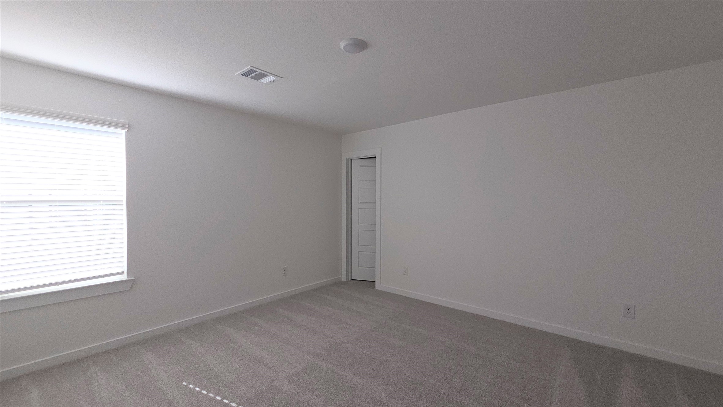 5847 Sunrise Btm Lane Fulshear, TX 77441 - Photo 18 of 21 a view of an empty room with a window