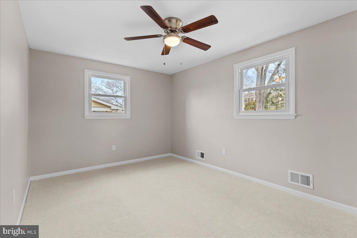 6812 Fulford Street Clinton, MD 20735 - Photo 11 of 32 a view of an empty room with a window