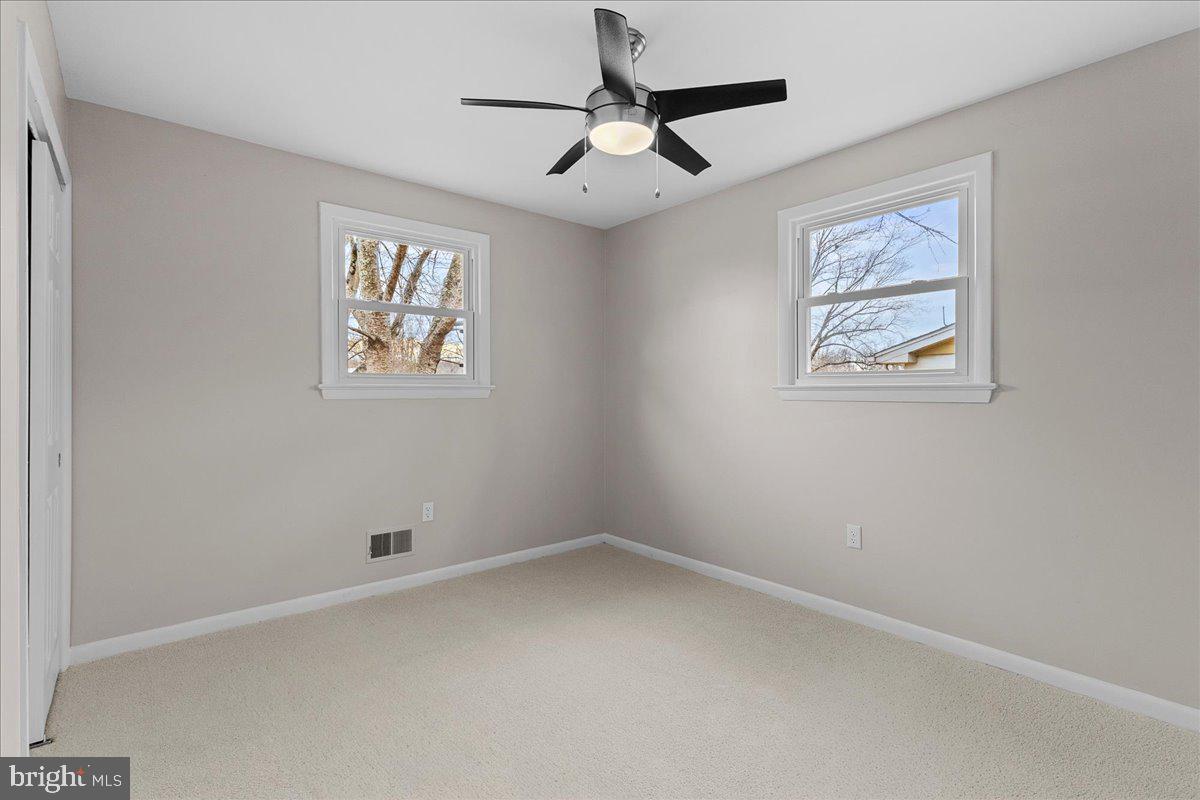 6812 Fulford Street Clinton, MD 20735 - Photo 15 of 32 a view of an empty room with a window