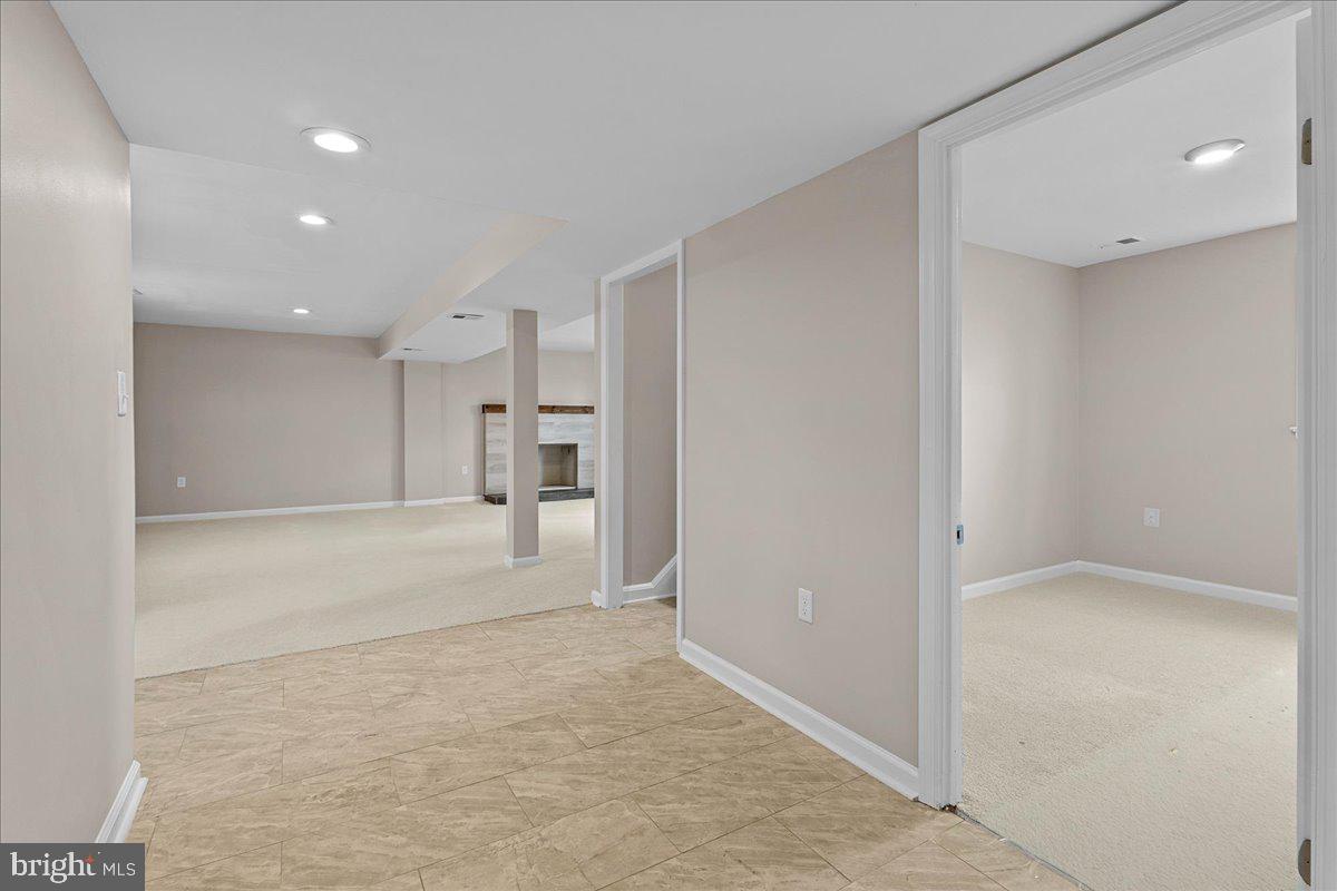 6812 Fulford Street Clinton, MD 20735 - Photo 21 of 32 a view of a kitchen with a refrigerator and a sink