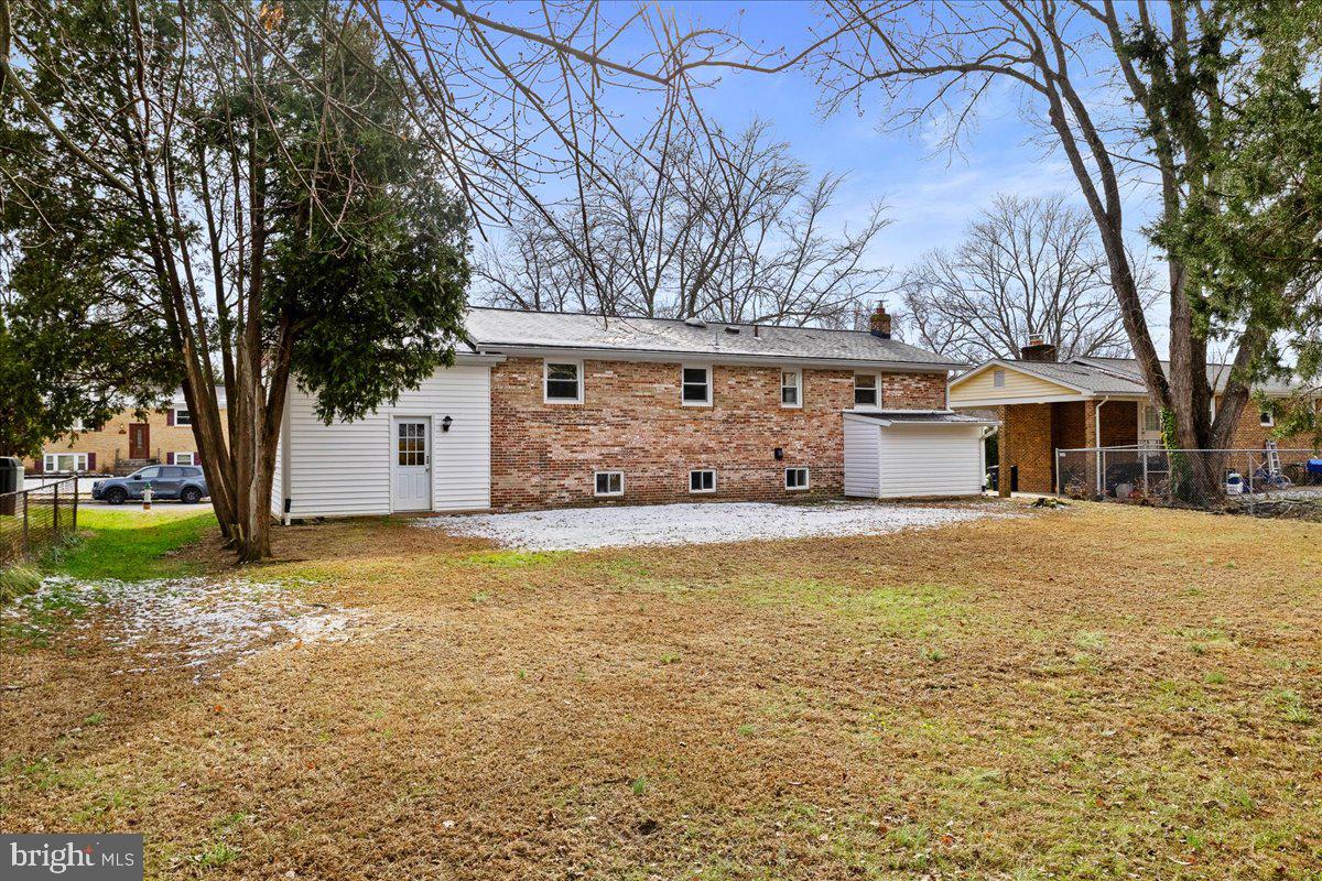6812 Fulford Street Clinton, MD 20735 - Photo 29 of 32 a front view of house with yard and trees