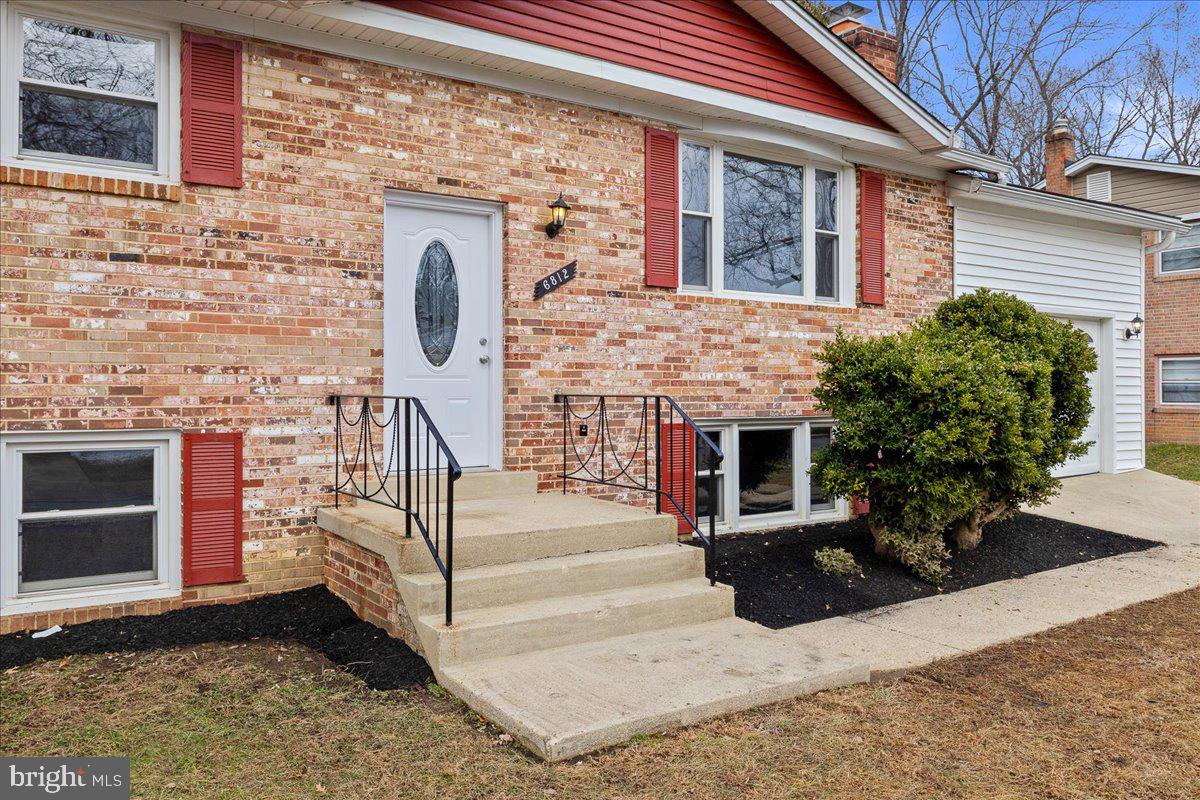 6812 Fulford Street Clinton, MD 20735 - Photo 3 of 32 a front view of a house with entryway