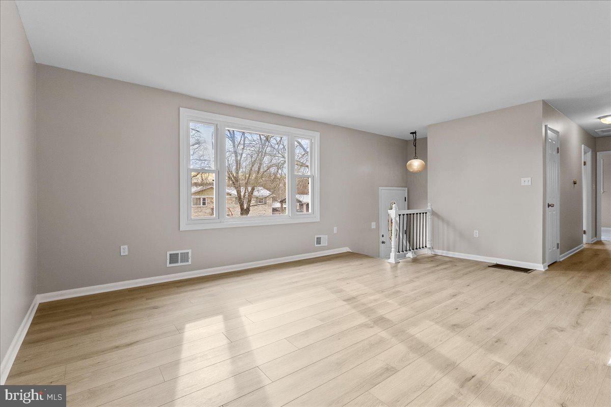 6812 Fulford Street Clinton, MD 20735 - Photo 4 of 32 an empty room with windows