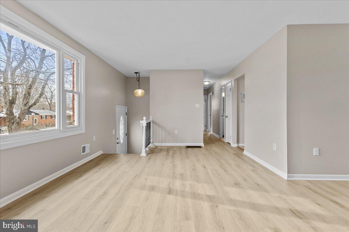 6812 Fulford Street Clinton, MD 20735 - Photo 5 of 32 a view of an empty room with a window