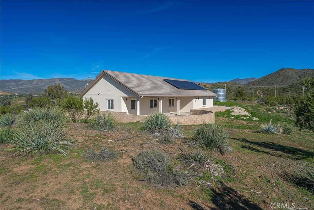 10540 Darling Road Agua Dulce, CA 91390 - Photo 49 of 56 a view of house with a yard