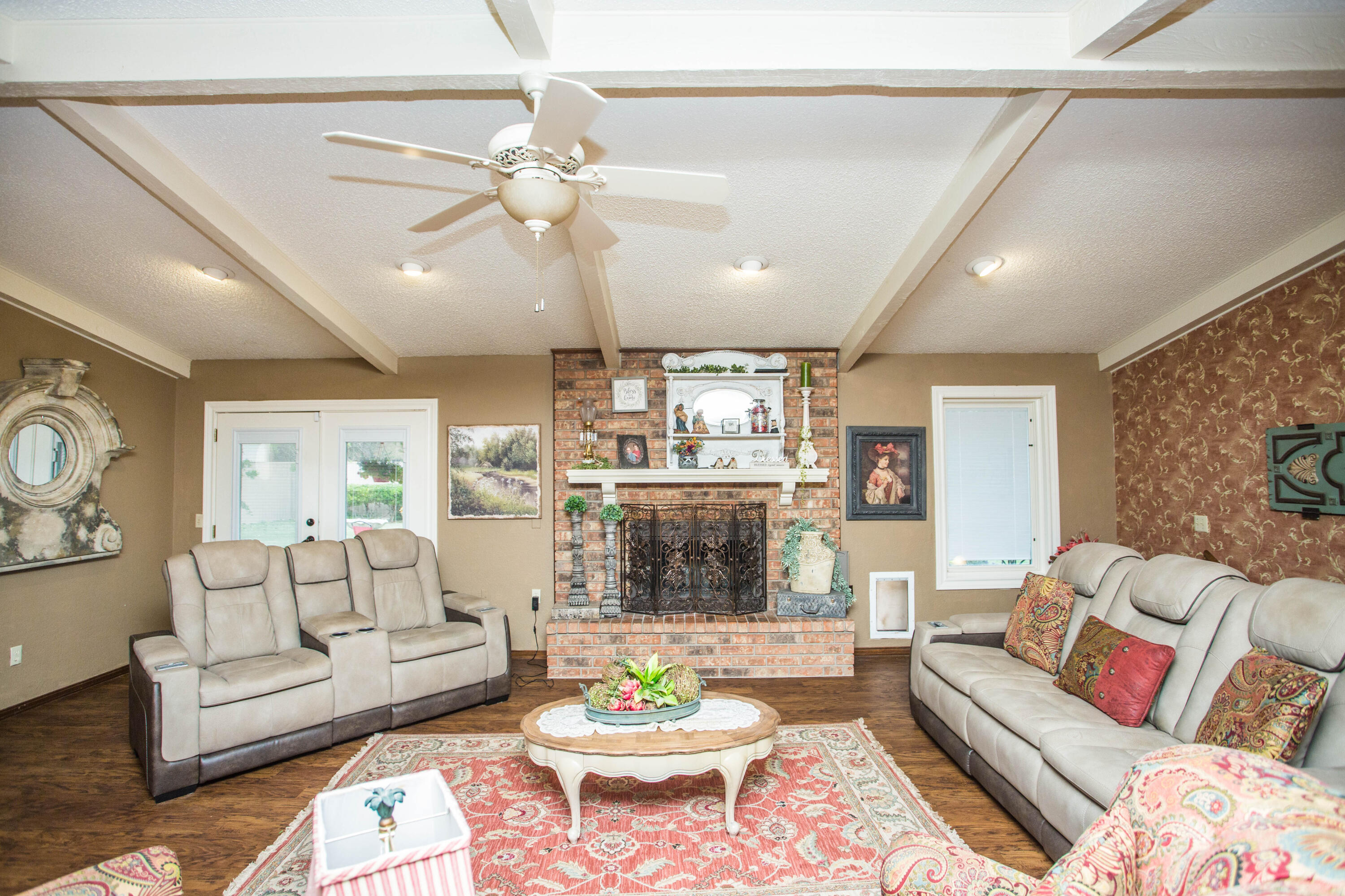 1304 Jefferson Drive Plainview, TX 79072 - Photo 15 of 50 a living room with furniture and a large window