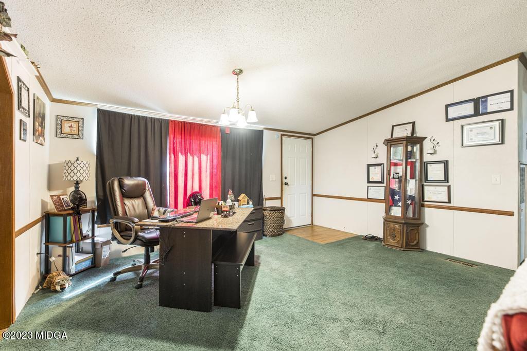 1592 Tribble Road Fort Valley, GA 31030 - Photo 26 of 30 a workspace with furniture and window