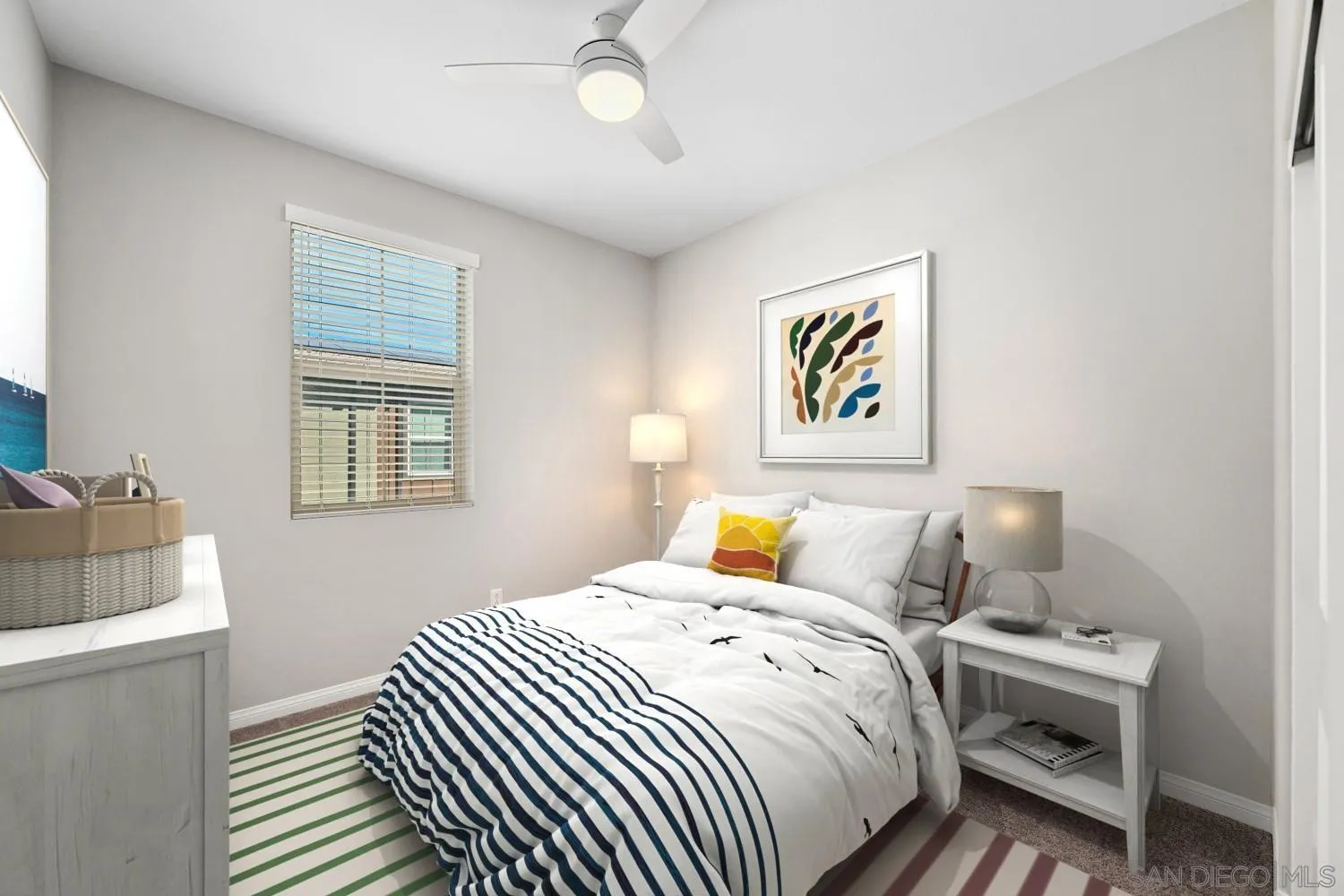 1515 Fig Tree Way Oceanside, CA 92056 - Photo 17 of 27 a bedroom with a bed and wooden floor
