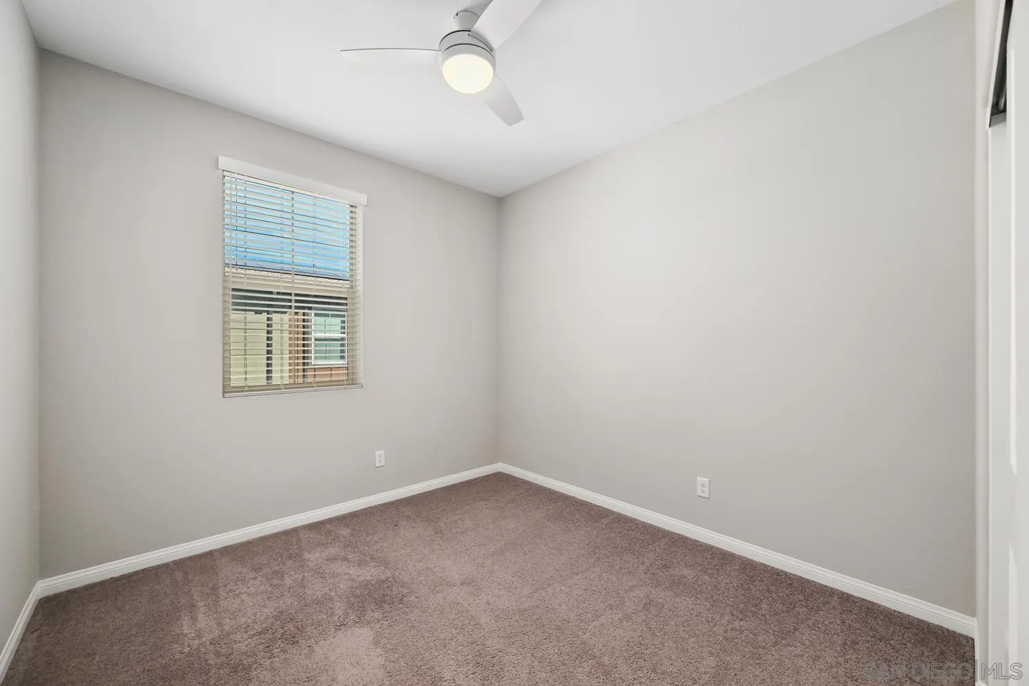 1515 Fig Tree Way Oceanside, CA 92056 - Photo 18 of 27 an empty room with a window