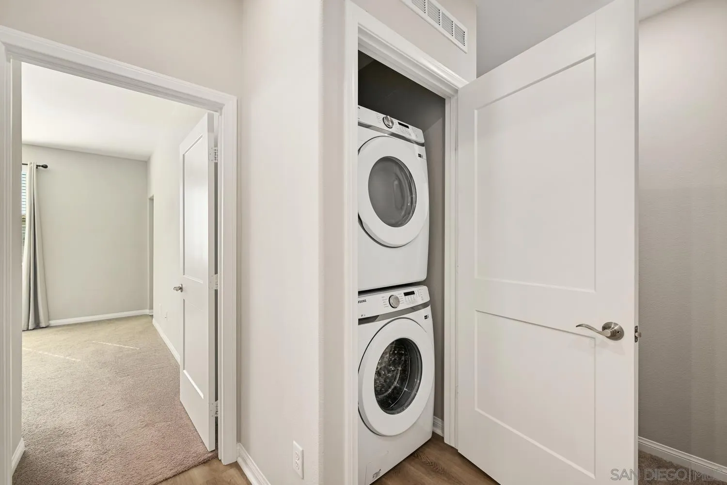 1515 Fig Tree Way Oceanside, CA 92056 - Photo 20 of 27 a utility room with dryer and washer