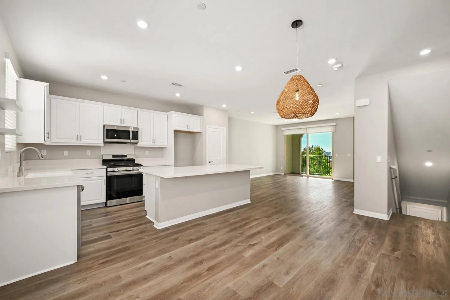 1515 Fig Tree Way Oceanside, CA 92056 - Photo 3 of 27 a view of kitchen with microwave and stove