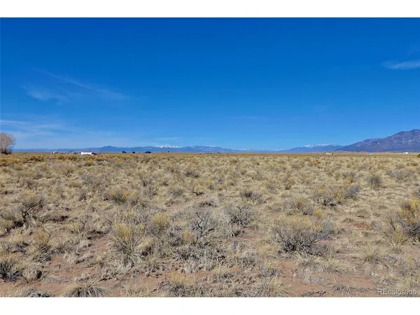 a view of an outdoor space and a mountain view