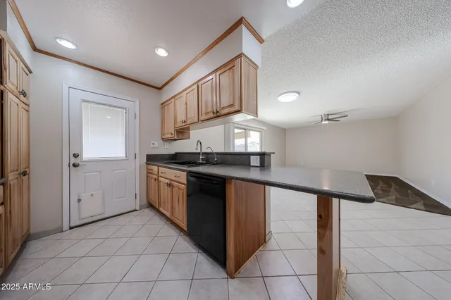 a view of a room with a sink and a window