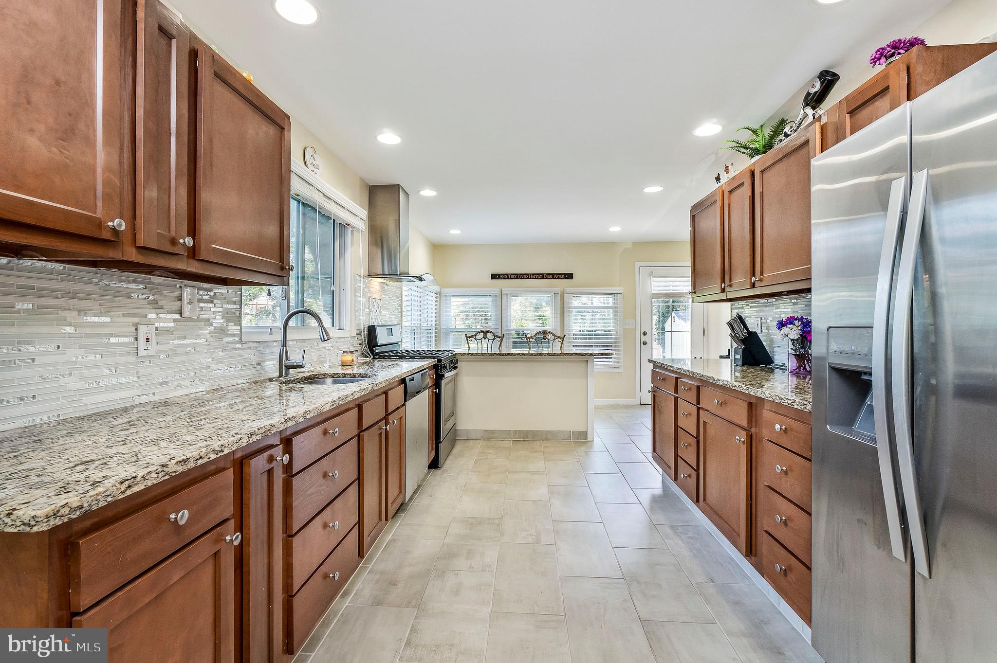 2403 Burridge Road Baltimore, MD 21234 - Photo 10 of 38 Kitchen with Breakfast Bar