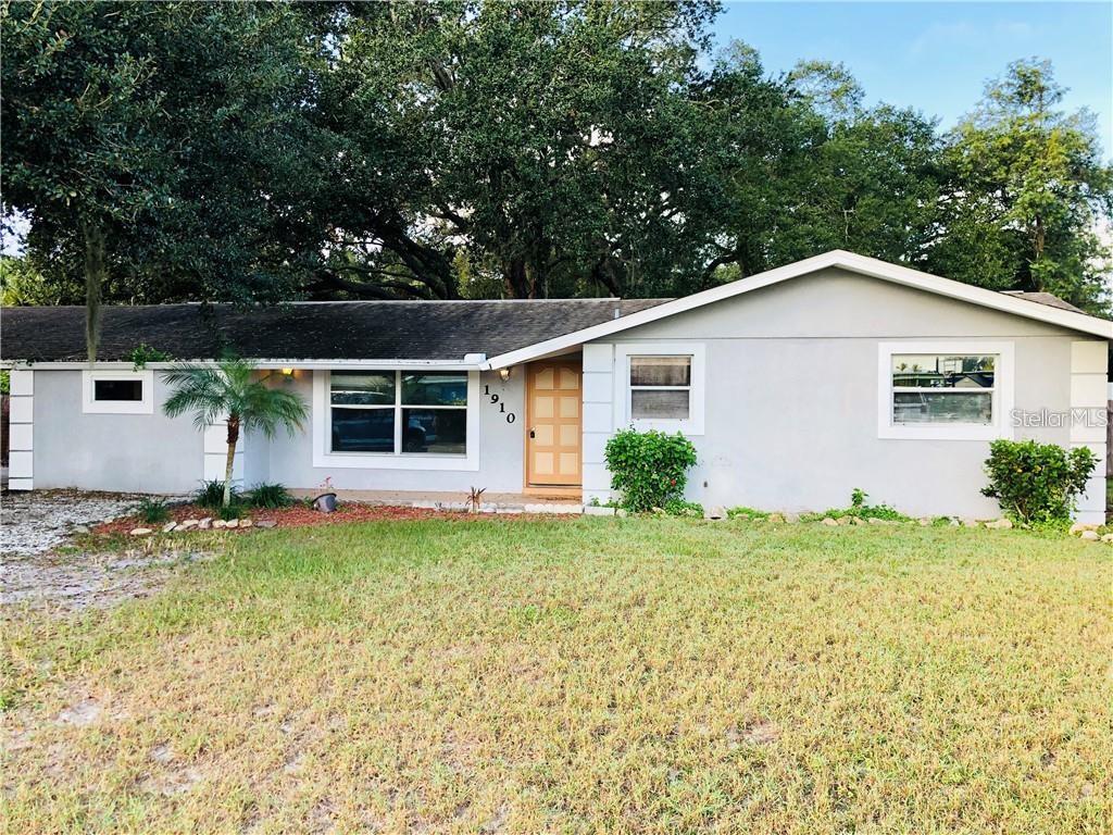 1910 Redfern Road Venice, FL 34293 - Photo 1 of 1 a front view of a house with a yard