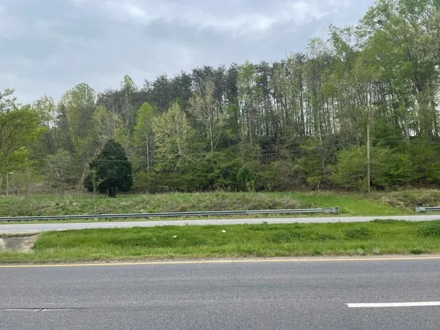 a view of a golf course with a road