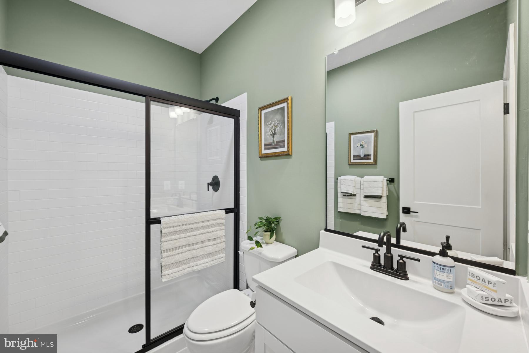 (lot 389-tbd Lot 389-tbd Street Ranson, WV 25438 - Photo 7 of 24 a bathroom with a sink a toilet and shower