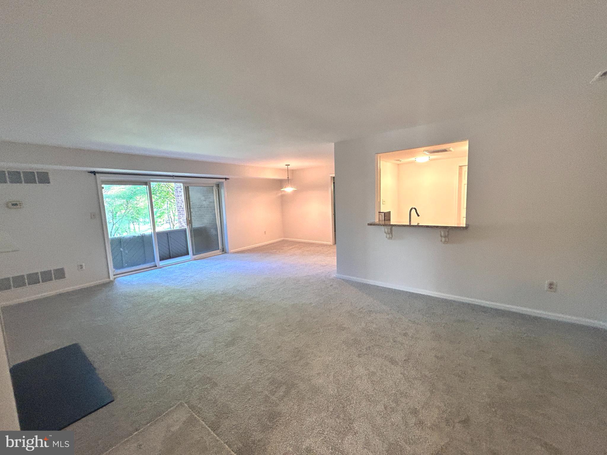 1705 Mountainview Drive, Unit 1705 Chesterbrook, PA 19087 - Photo 14 of 23 an empty room with windows