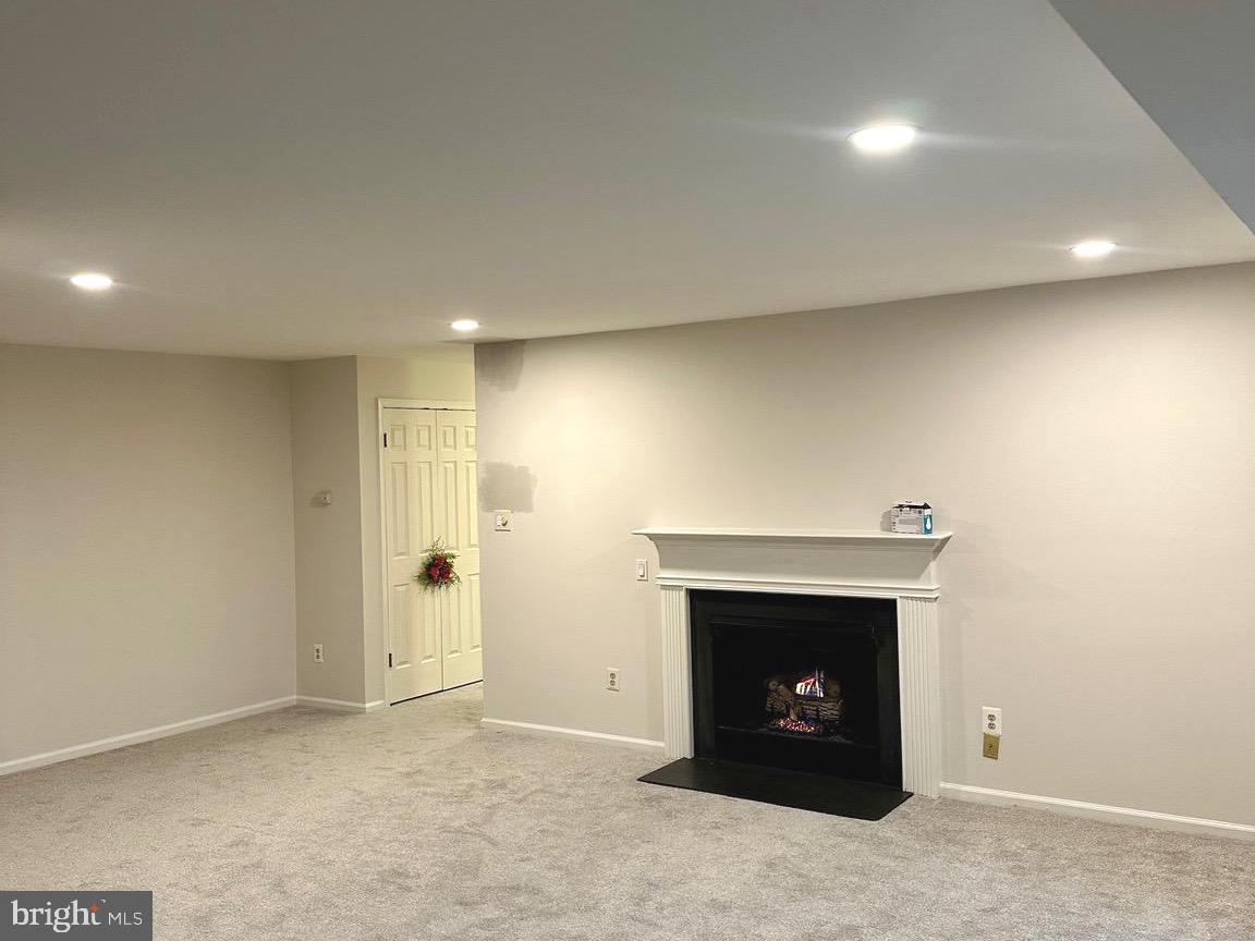 1705 Mountainview Drive, Unit 1705 Chesterbrook, PA 19087 - Photo 23 of 23 an empty room with a fireplace