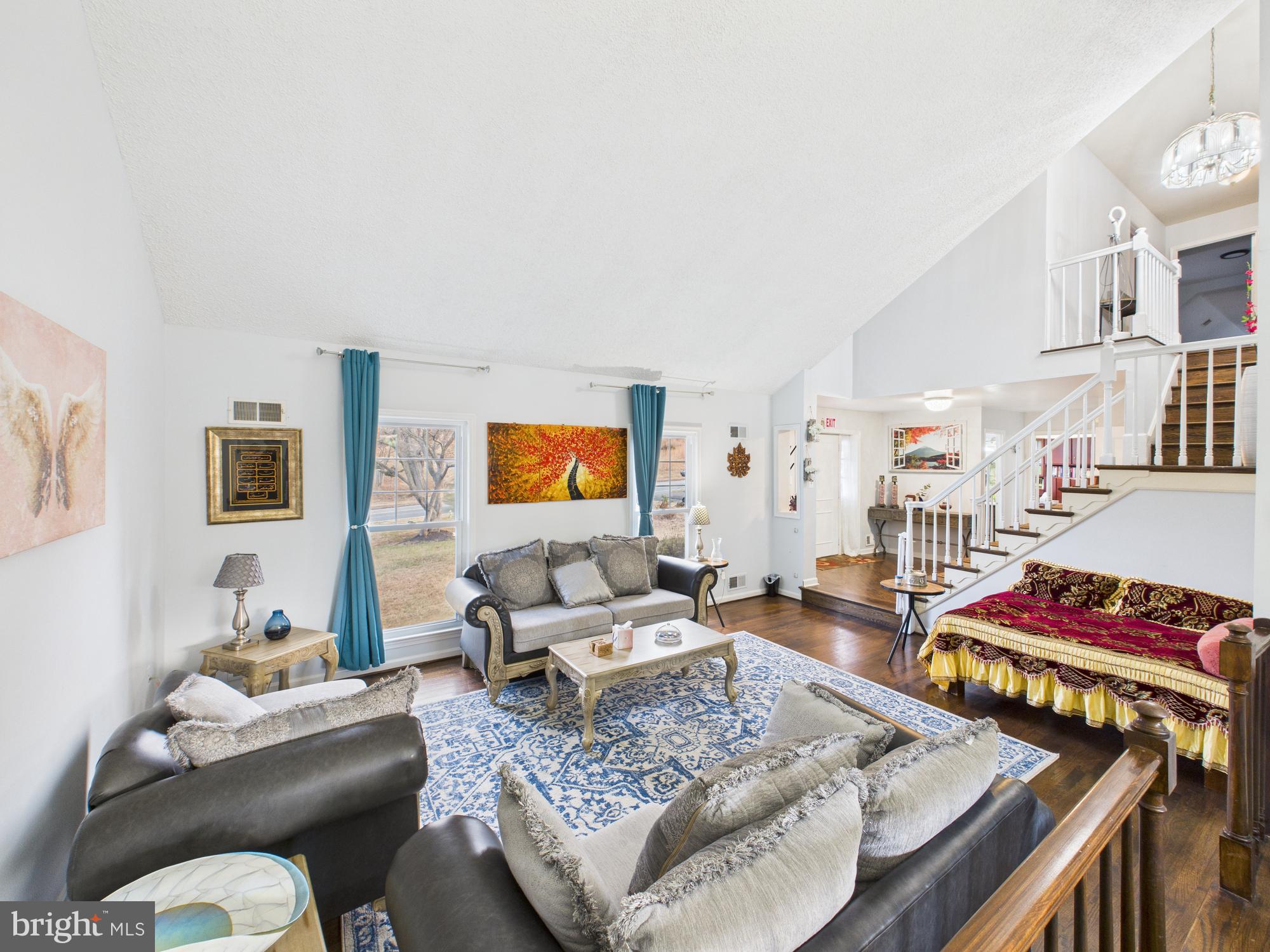 14212 Notley Road Silver Spring, MD 20904 - Photo 23 of 43 a living room with furniture and a rug