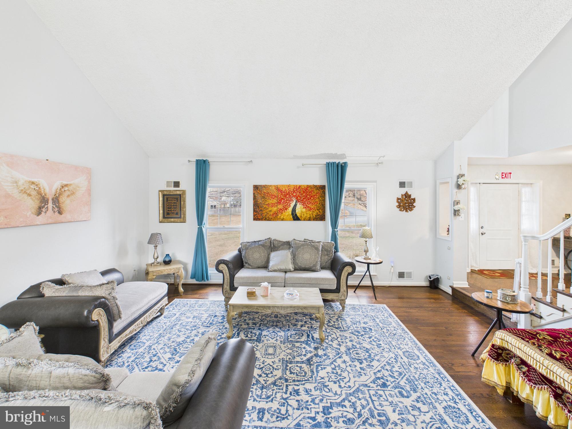 14212 Notley Road Silver Spring, MD 20904 - Photo 24 of 43 a living room with furniture and a couch