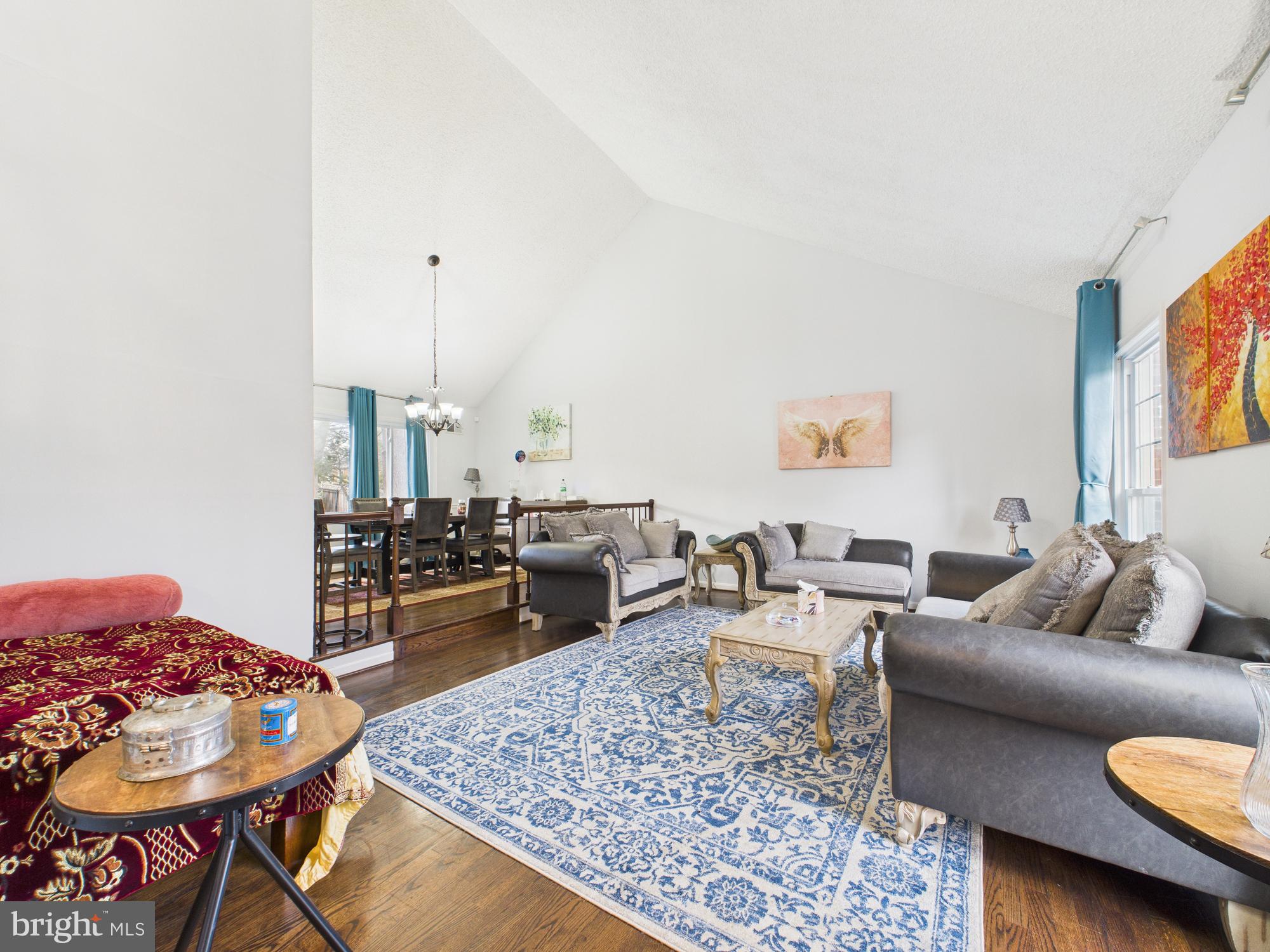 14212 Notley Road Silver Spring, MD 20904 - Photo 25 of 43 a living room with furniture and a couch