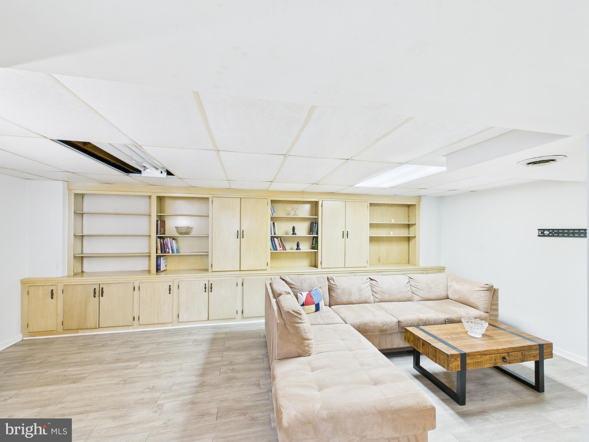 14212 Notley Road Silver Spring, MD 20904 - Photo 27 of 43 a living room with furniture and a window