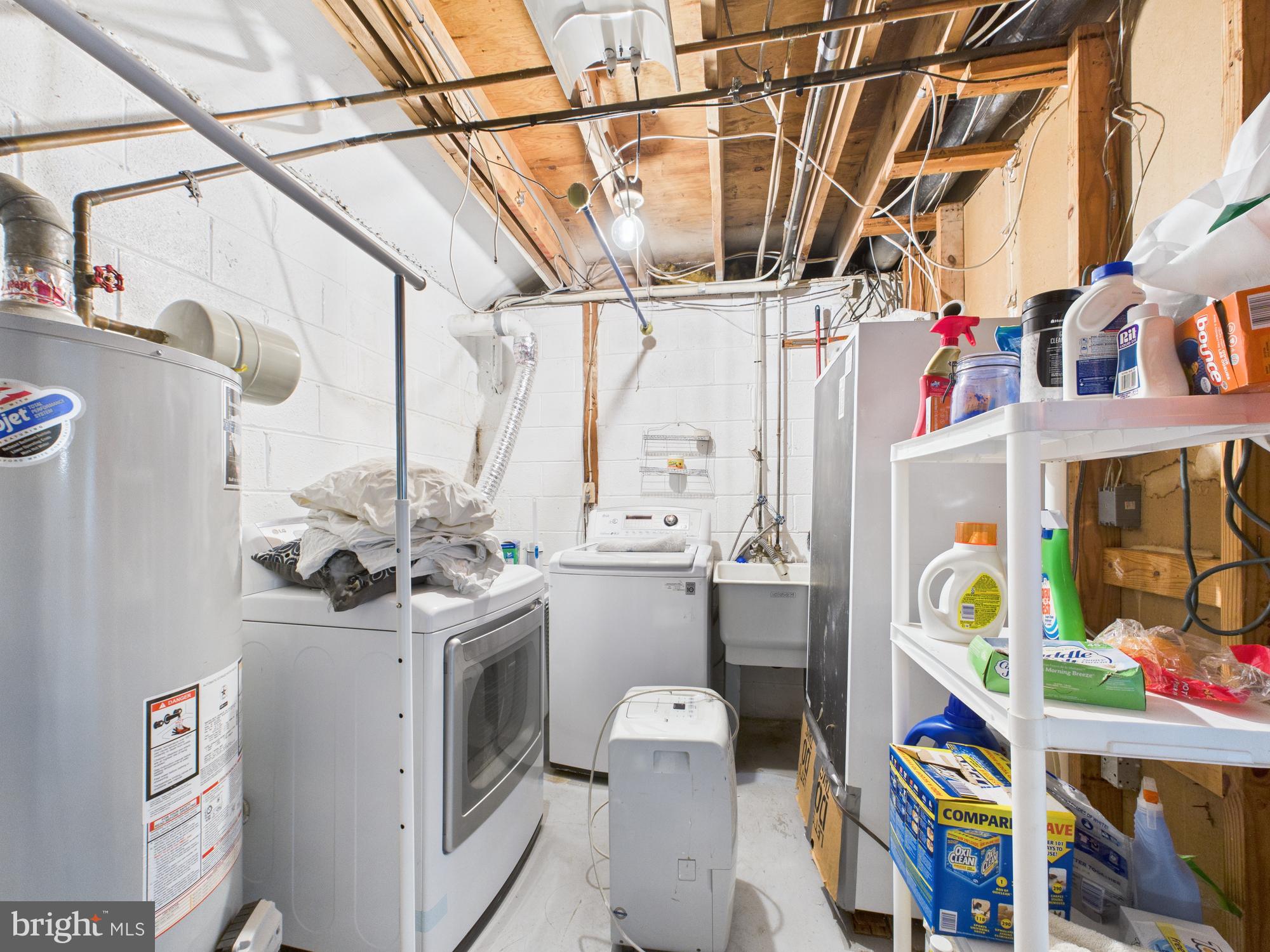 14212 Notley Road Silver Spring, MD 20904 - Photo 31 of 43 a utility room with dryer and washer