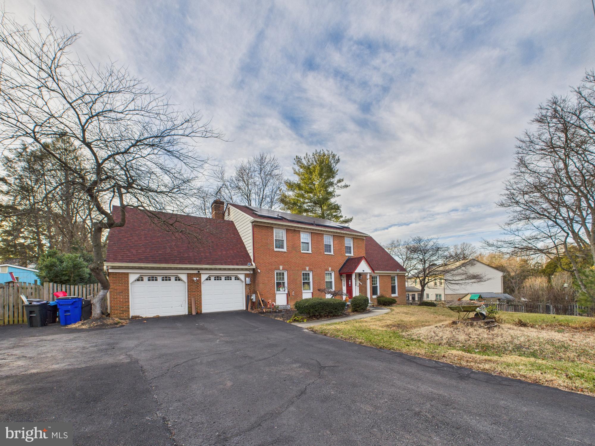 14212 Notley Road Silver Spring, MD 20904 - Photo 4 of 43 a view of large house with a street