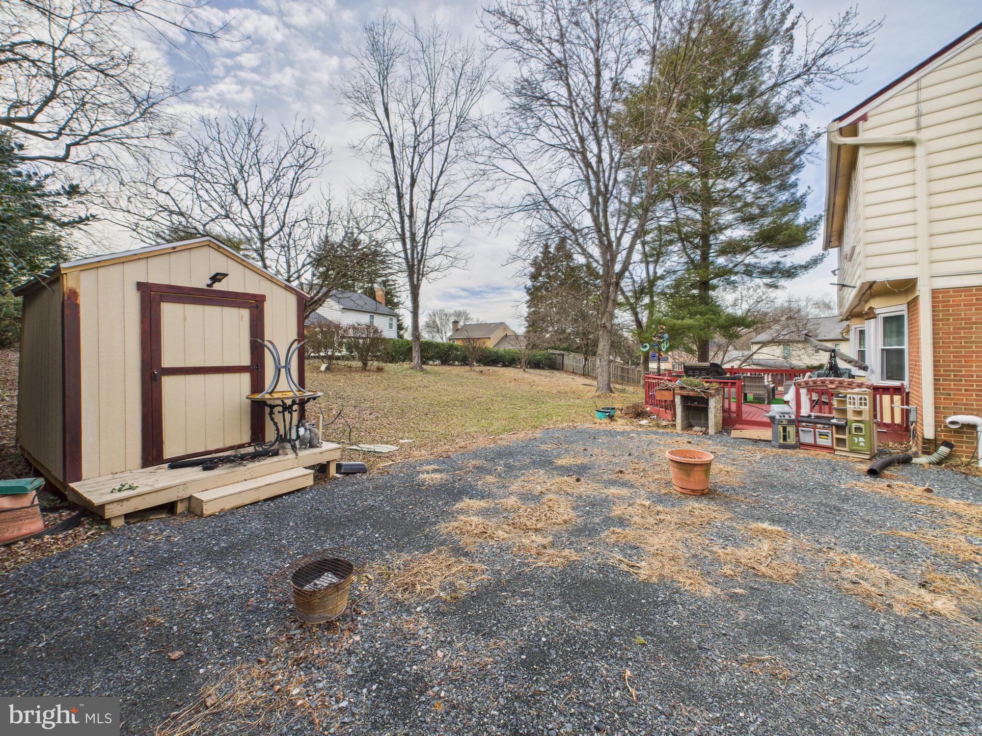 14212 Notley Road Silver Spring, MD 20904 - Photo 9 of 43 a view of a street with a large tree