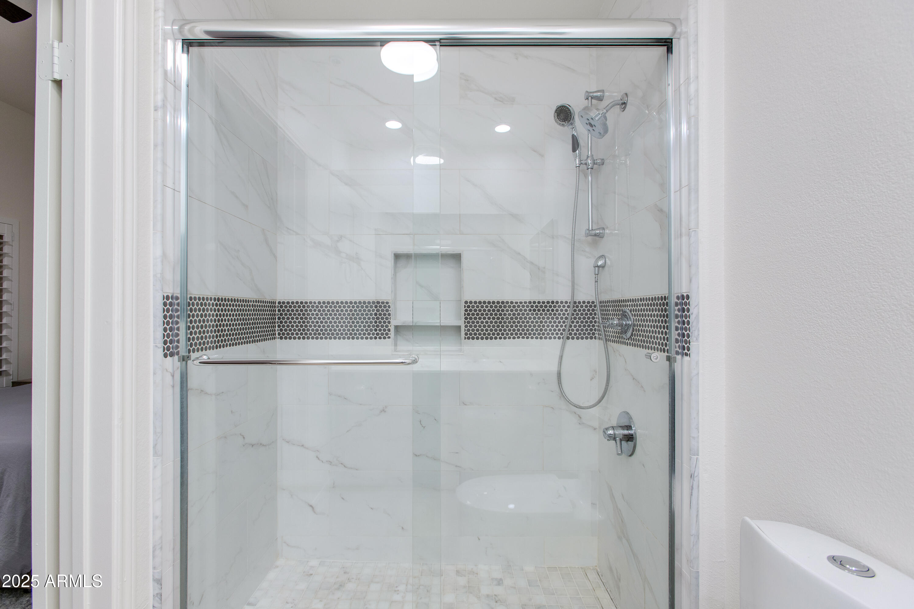 8245 East Bell Road, Unit 102 Scottsdale, AZ 85260 - Photo 15 of 21 a bathroom with a shower