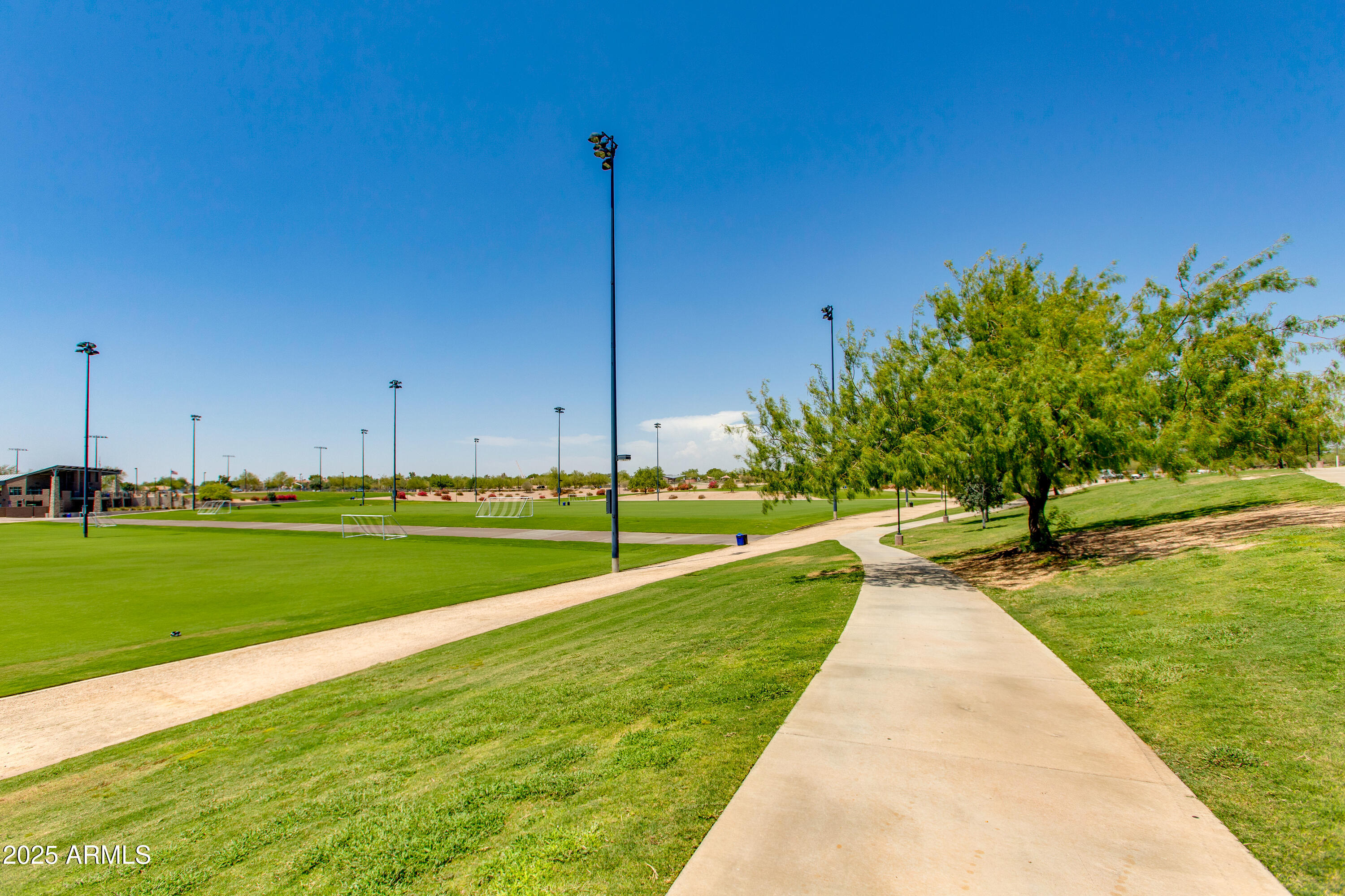 8245 East Bell Road, Unit 102 Scottsdale, AZ 85260 - Photo 21 of 21 a view of a park with large trees