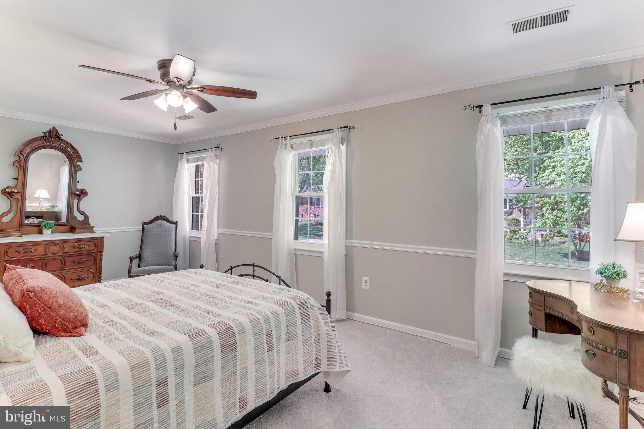 6685 Old Blacksmith Drive Burke, VA 22015 - Photo 17 of 49 Primary bedroom with lots of windows!