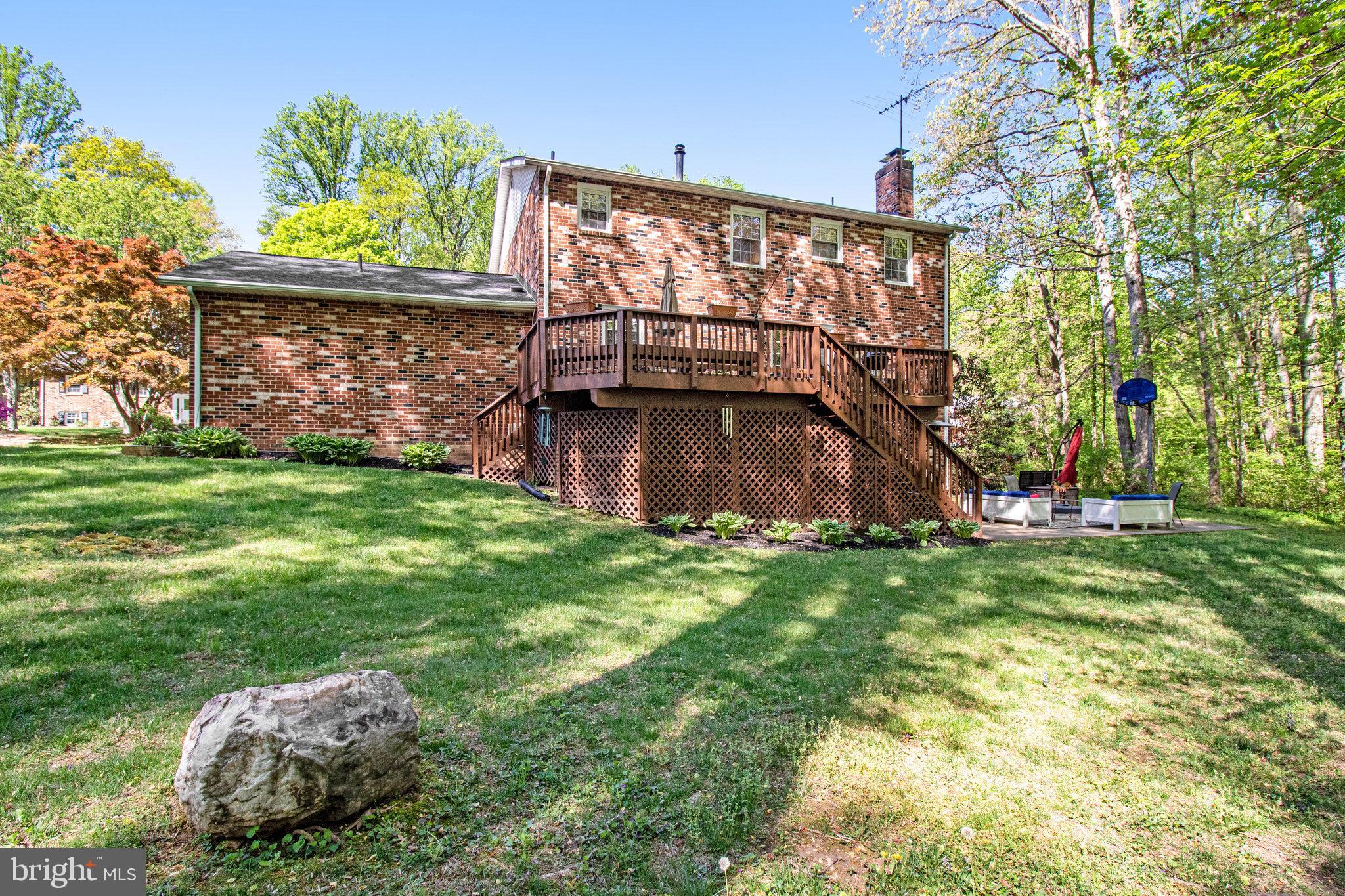 6685 Old Blacksmith Drive Burke, VA 22015 - Photo 42 of 49 Deck walks down to backyard!