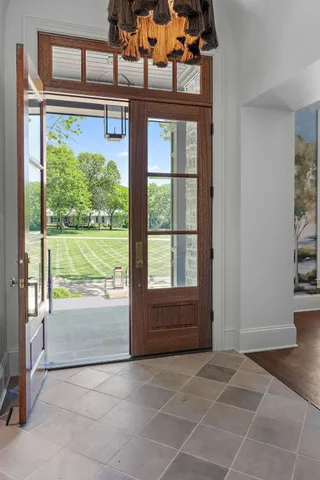 a kitchen with stainless steel appliances granite countertop a stove and a sink