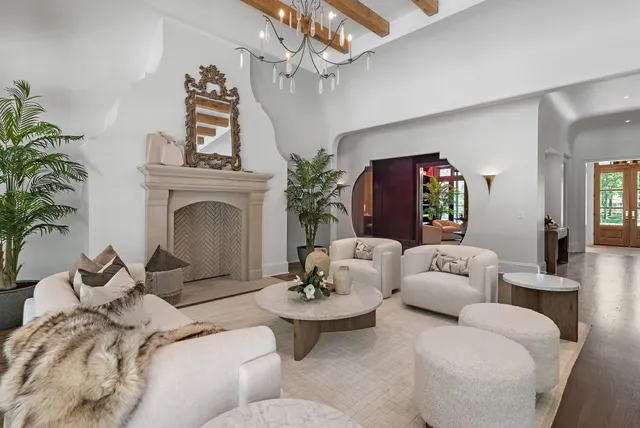 a bedroom with bed and painting on the wall