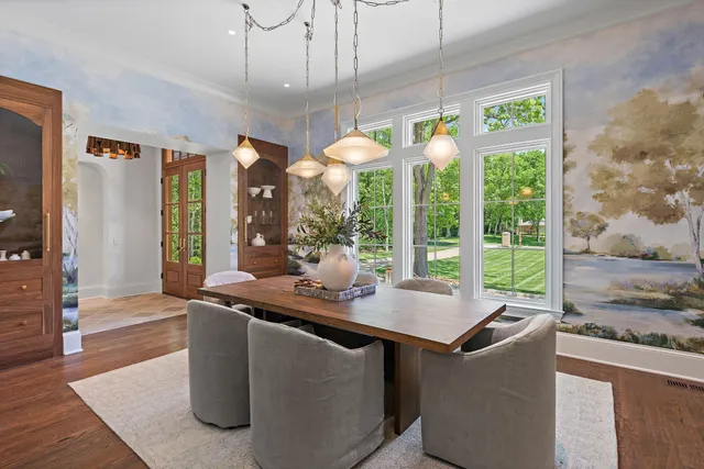 a bathroom with a double vanity sink mirror and shower