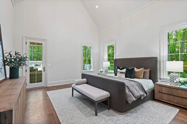 a bathroom with a shower toilet and sink