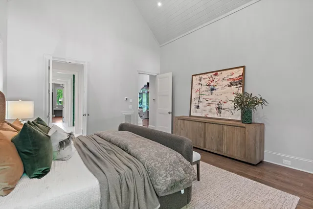 a outdoor living space with furniture potted plant and a large window