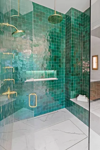 a bathroom with a granite countertop toilet a sink and a mirror