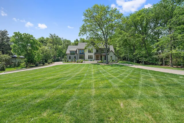 a view of a house with a big yard