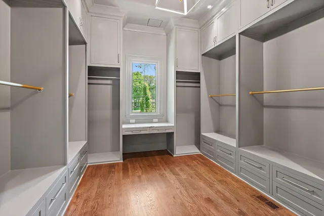 a view of a terrace with a table and chairs in a patio