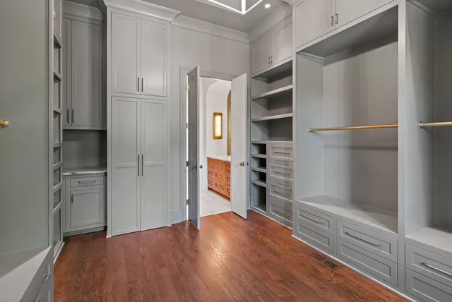 a front view of a house with swimming pool and porch