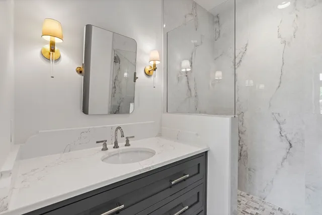 a front view of a house with a yard table and chairs