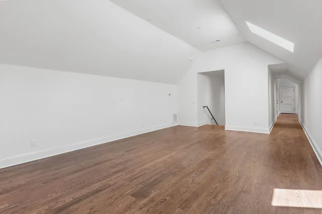a view of a house with pool and chairs
