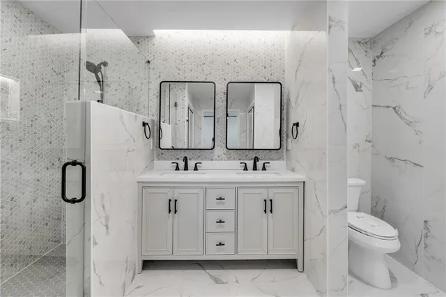 a bathroom with a sink and a shower