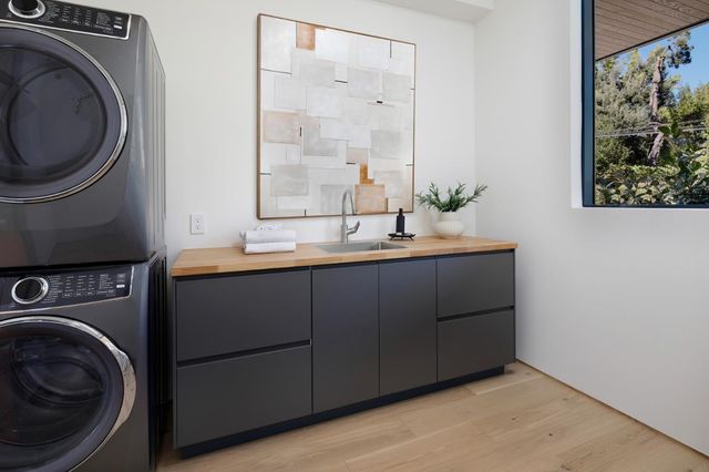 a view of kitchen sink and microwave