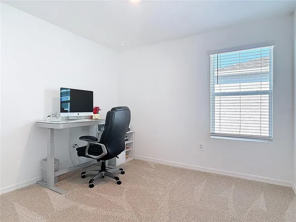 a view of workspace with a window